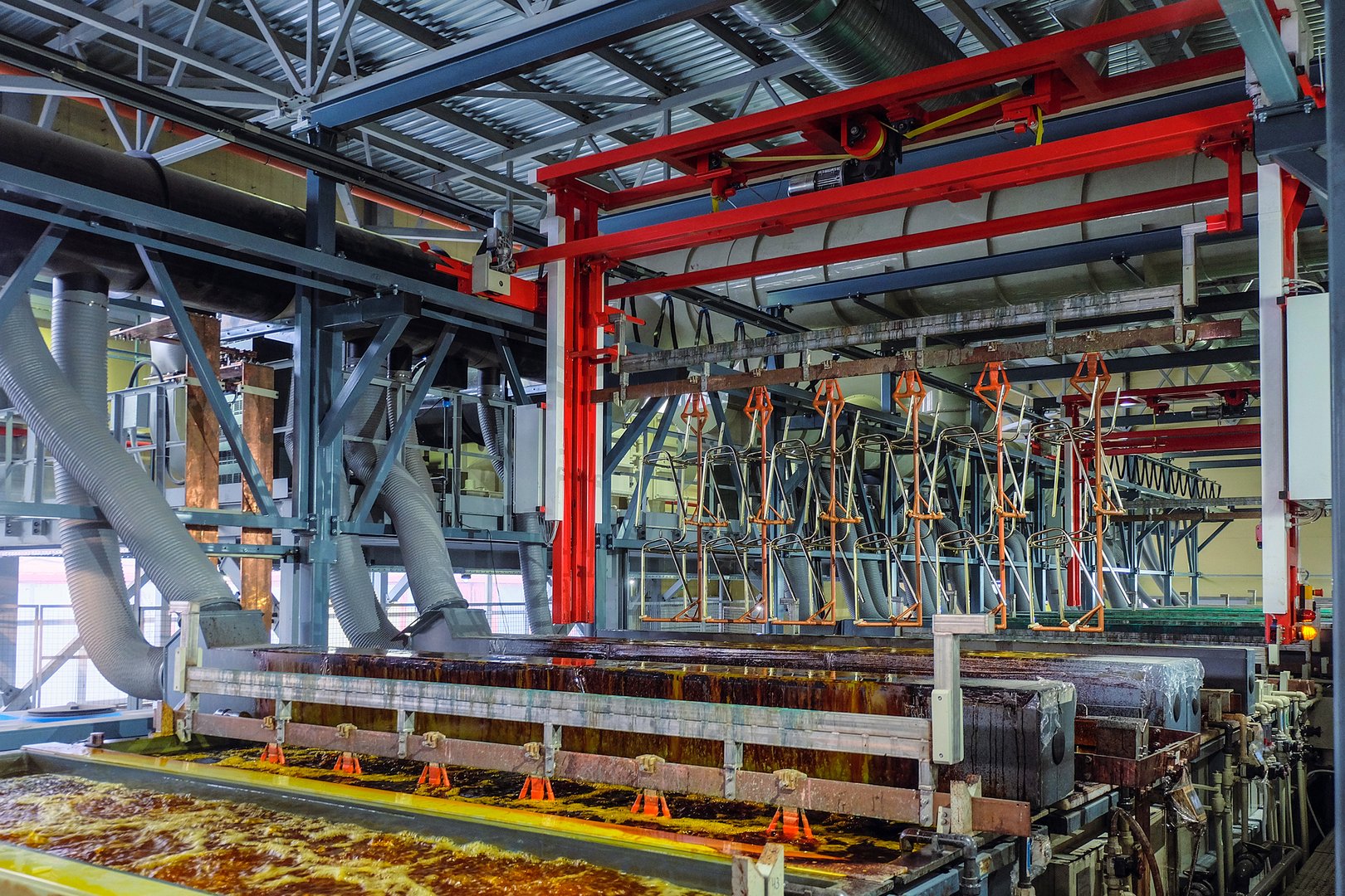 Fragment of a galvanic line. Production process of galvanic copper, nickel and chrome plating steel metal products.