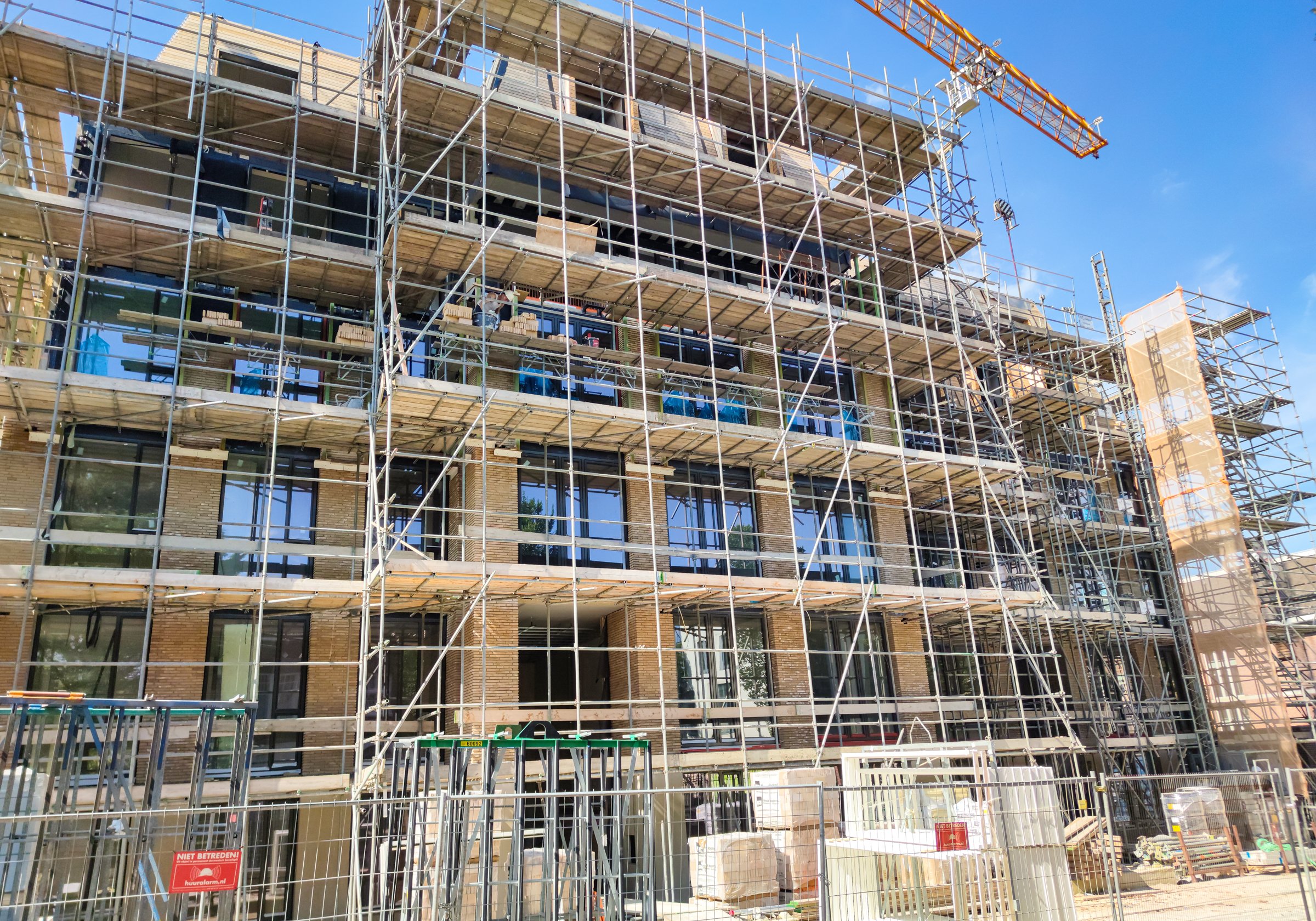 The Hague, Netherlands - August 28, 2024: Construction site with apartment complex under construction.