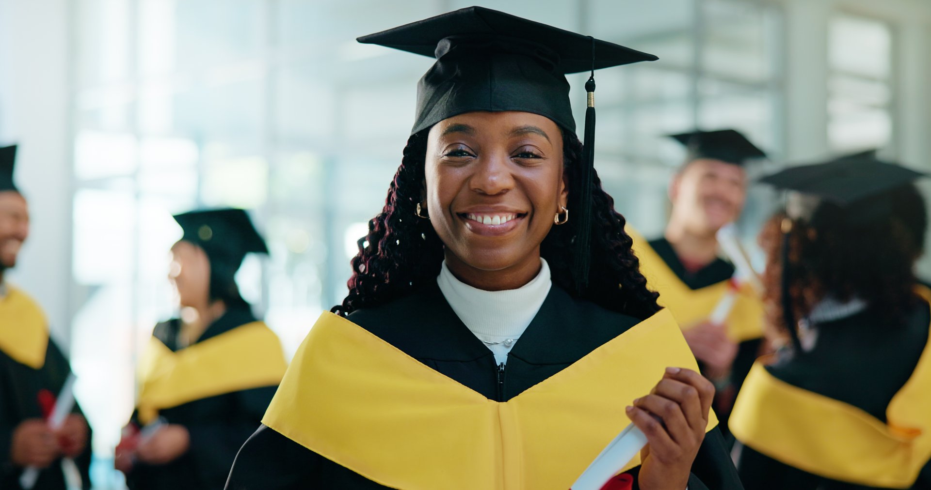 Happy, student and portrait of black woman at graduation with education goal, degree or achievement. Smile, university graduate and African female person with college diploma on campus for success.
