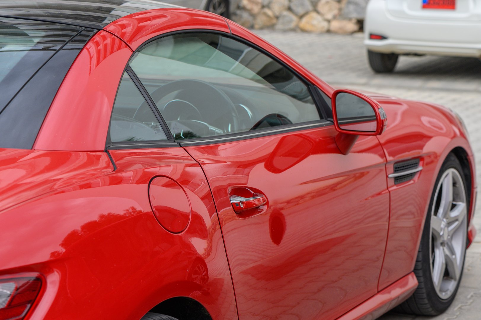 Gaziveren Cyprus 04.29.2024 red Mercedes SLK 250 body parts 4