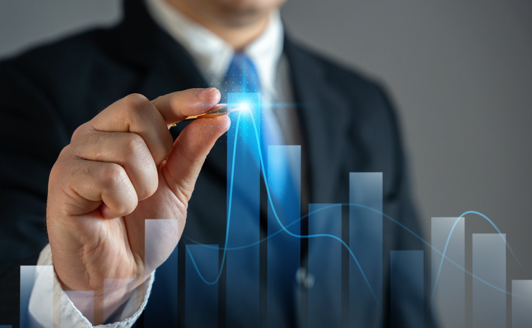 Businessman notes the highest economic indicators. High income, peak profits and abnormal sales. Concept of success in business and commerce.