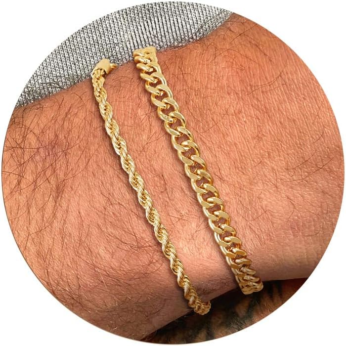 Two gold chain bracelets on a person's wrist, featuring different patterns: one twisted rope and one curb link design.