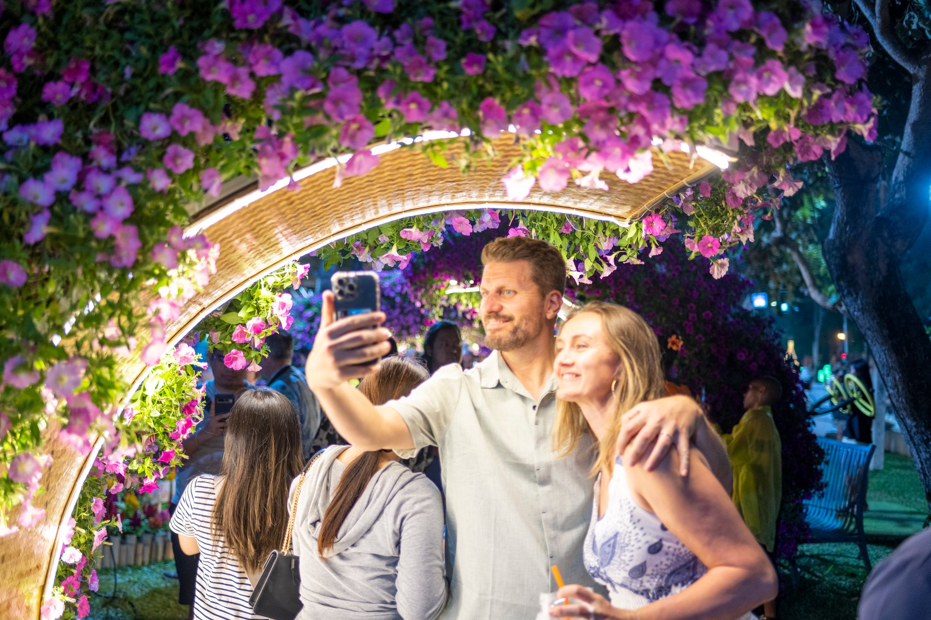 Chiang Mai,Thailand-February 07 2025:At night people enjoy the festival of flowers,and light displays,as they mingle,have fun and appreciate the rich floral heritage of the Chiang Mai region.