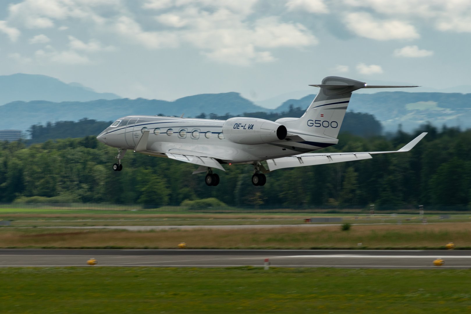 Zurich, Switzerland, July 13, 2023 OE-LVA Gulfstream G500 aircraft is landing on runway 14