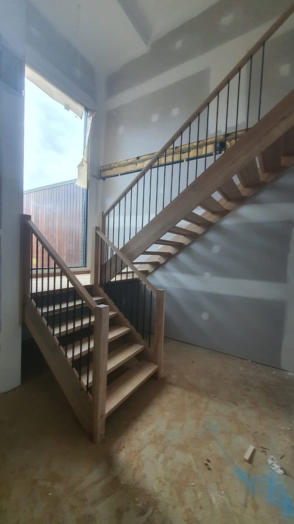 Stairs staining project before - original condition requiring professional refinishing