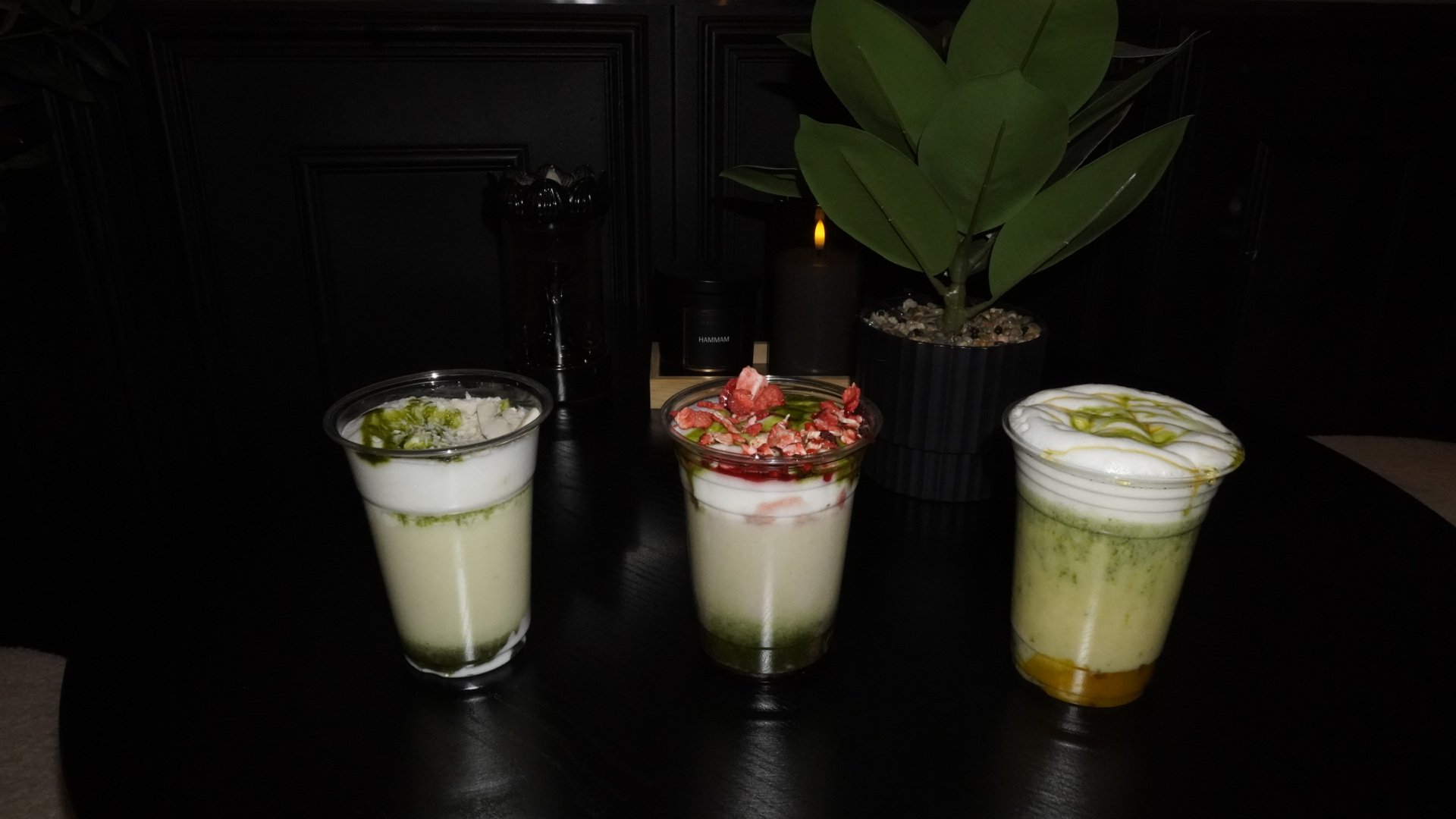 Iced Matcha Latte in café glass