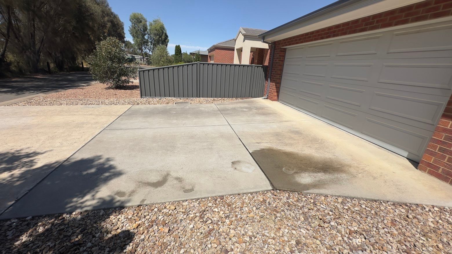 Before - Driveway before pressure washing
