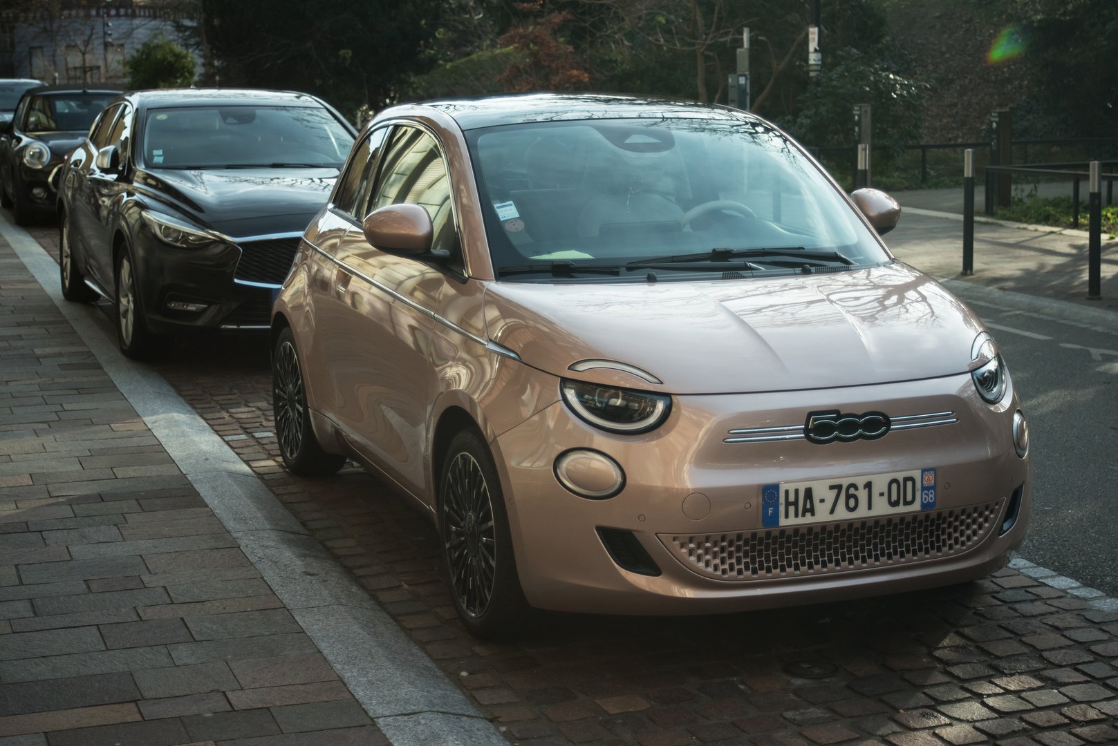 Mulhouse - France - 1 january 2025 - Front view of pink electric fiat 500 parked in the street