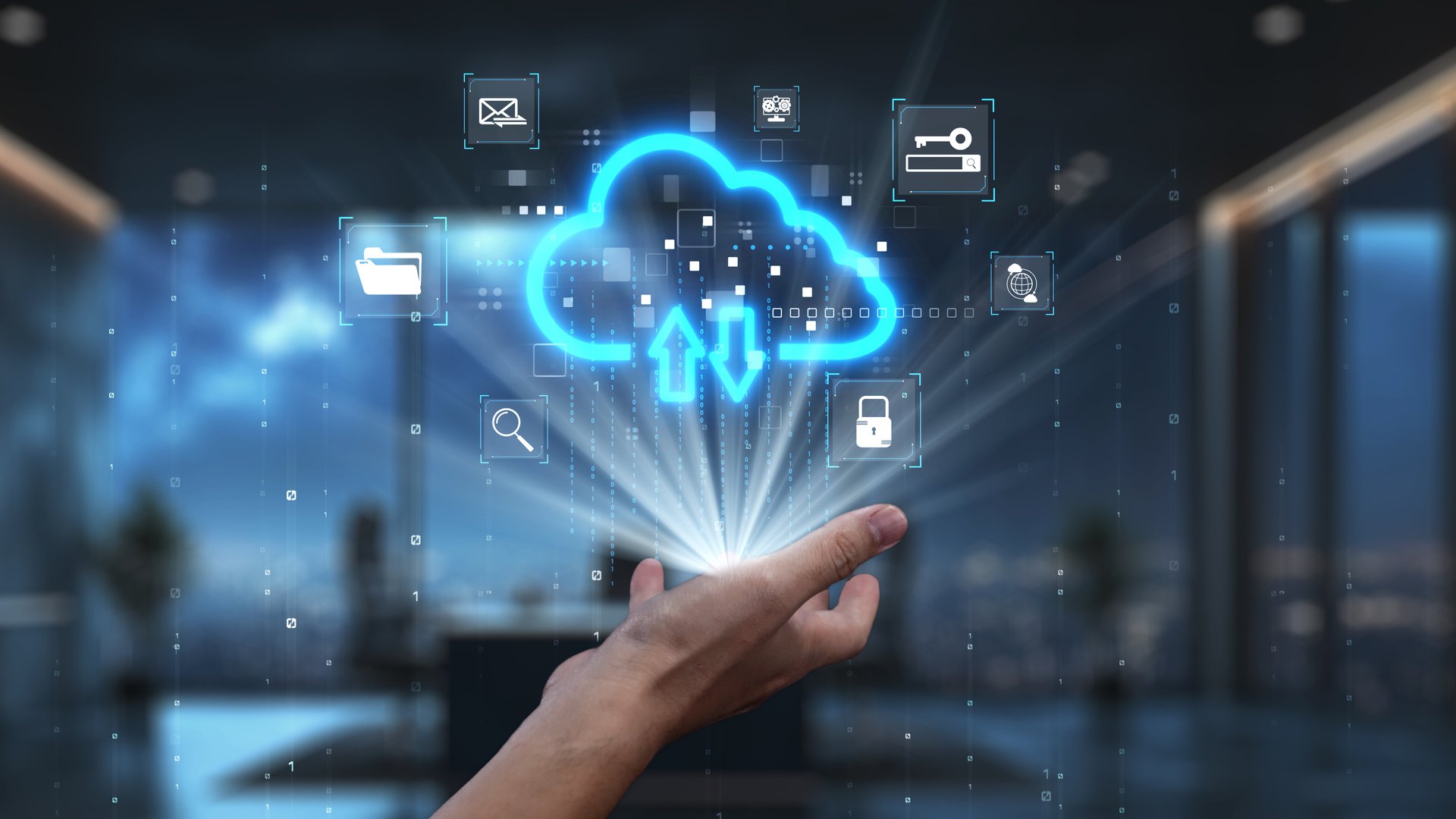 A person hand emerges with a cloud symbol and digital icons representing modern cloud computing concepts in a sleek office setting, emphasizing technology and innovation. Auvana