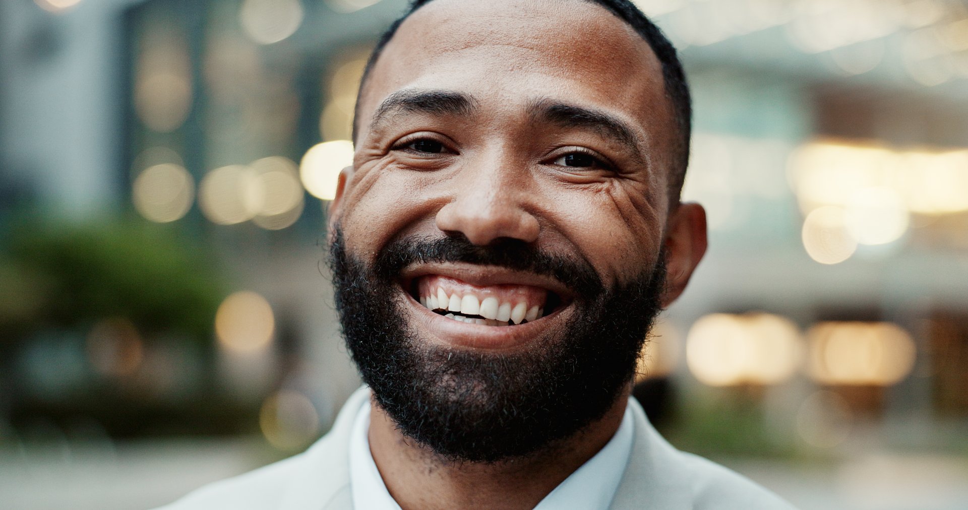 Happy, city and portrait of business black man on morning commute, travel and journey to office. Professional, corporate and face of entrepreneur with confidence, company pride and job opportunity