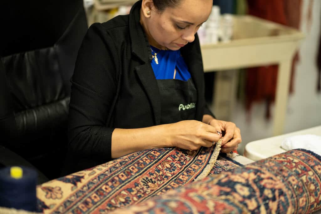 Professional antique rug repair and restoration service in Atlanta - expert hand weaving and fiber care