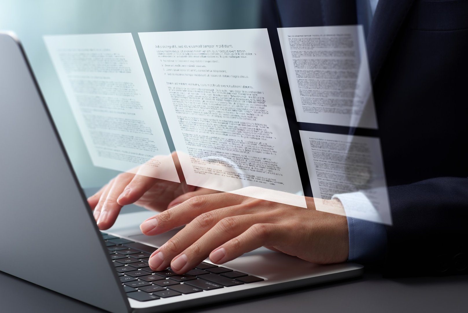 Preparing documents and writing report. Documentation. Hands typing on laptop computer keyboard. Businessman in suit working at desk in office.