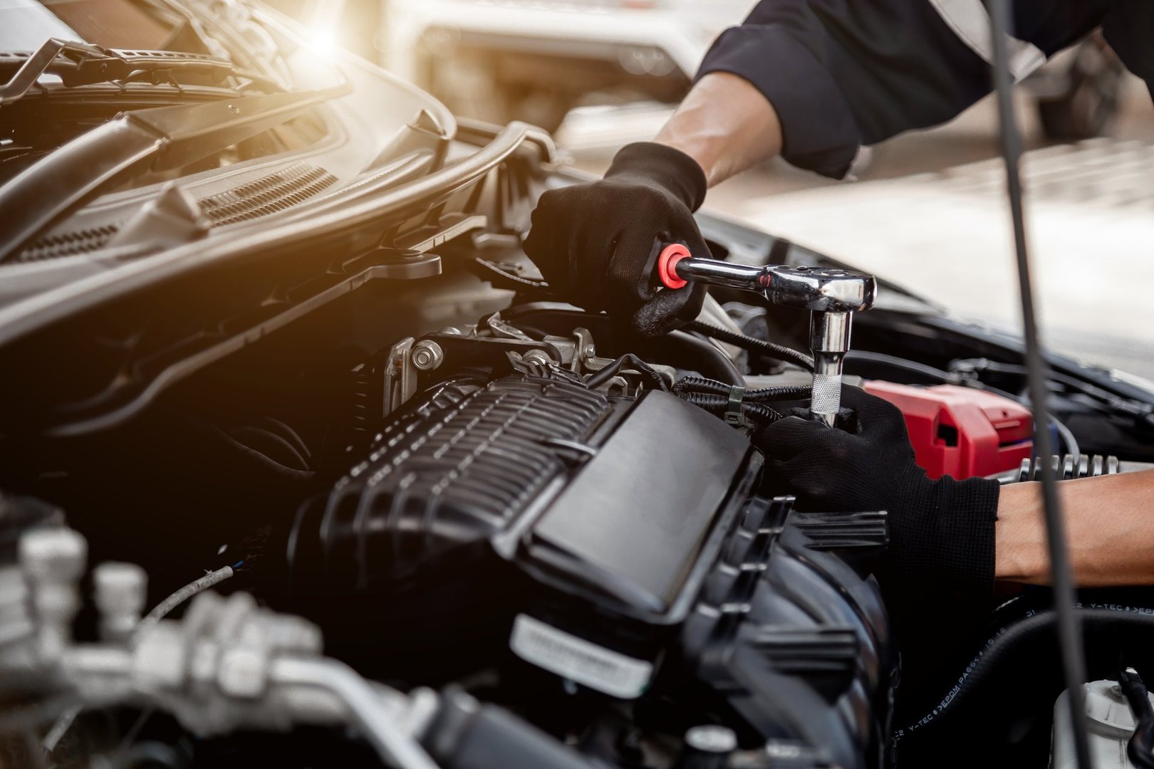 Car care maintenance and servicing, Close-up hand technician auto mechanic using the wrench to repairing change spare part car engine problem and insurance service support.
