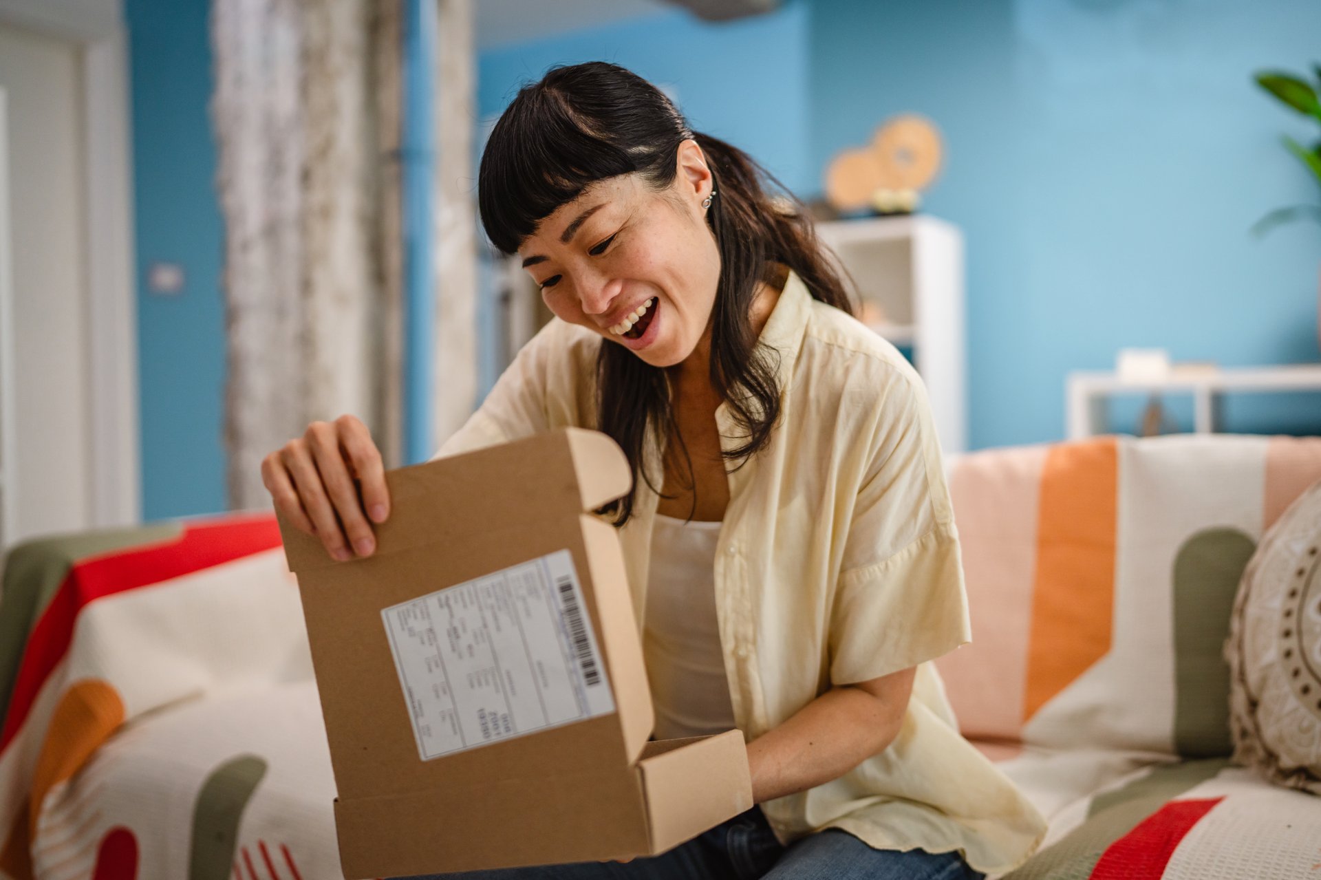 Woman opening package