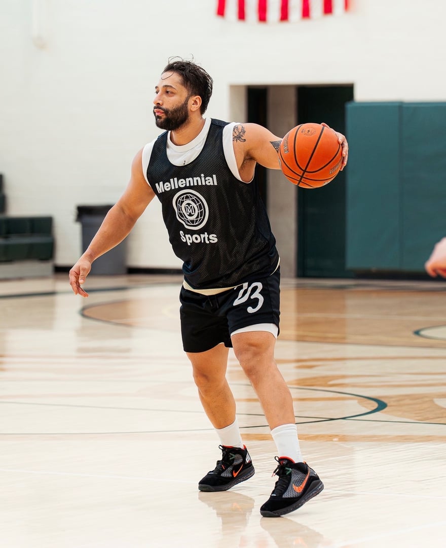 Happy basketball players celebrating and having fun after a game