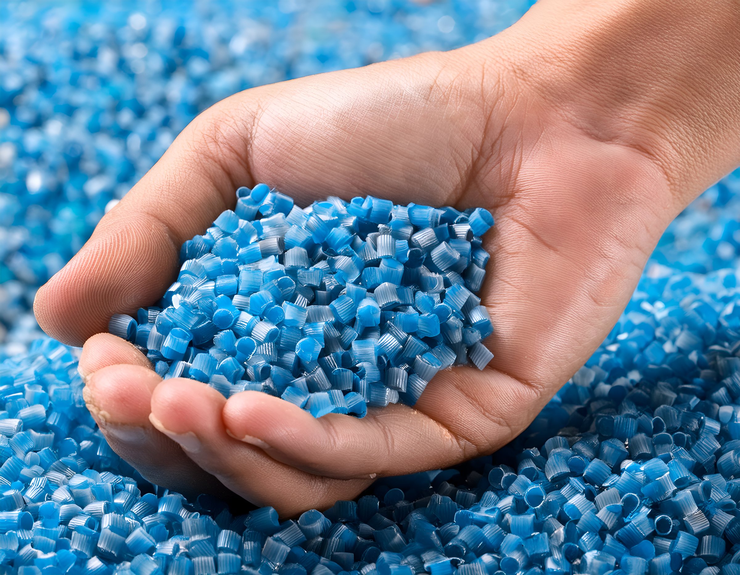 thermoplastic polymer granules in hand