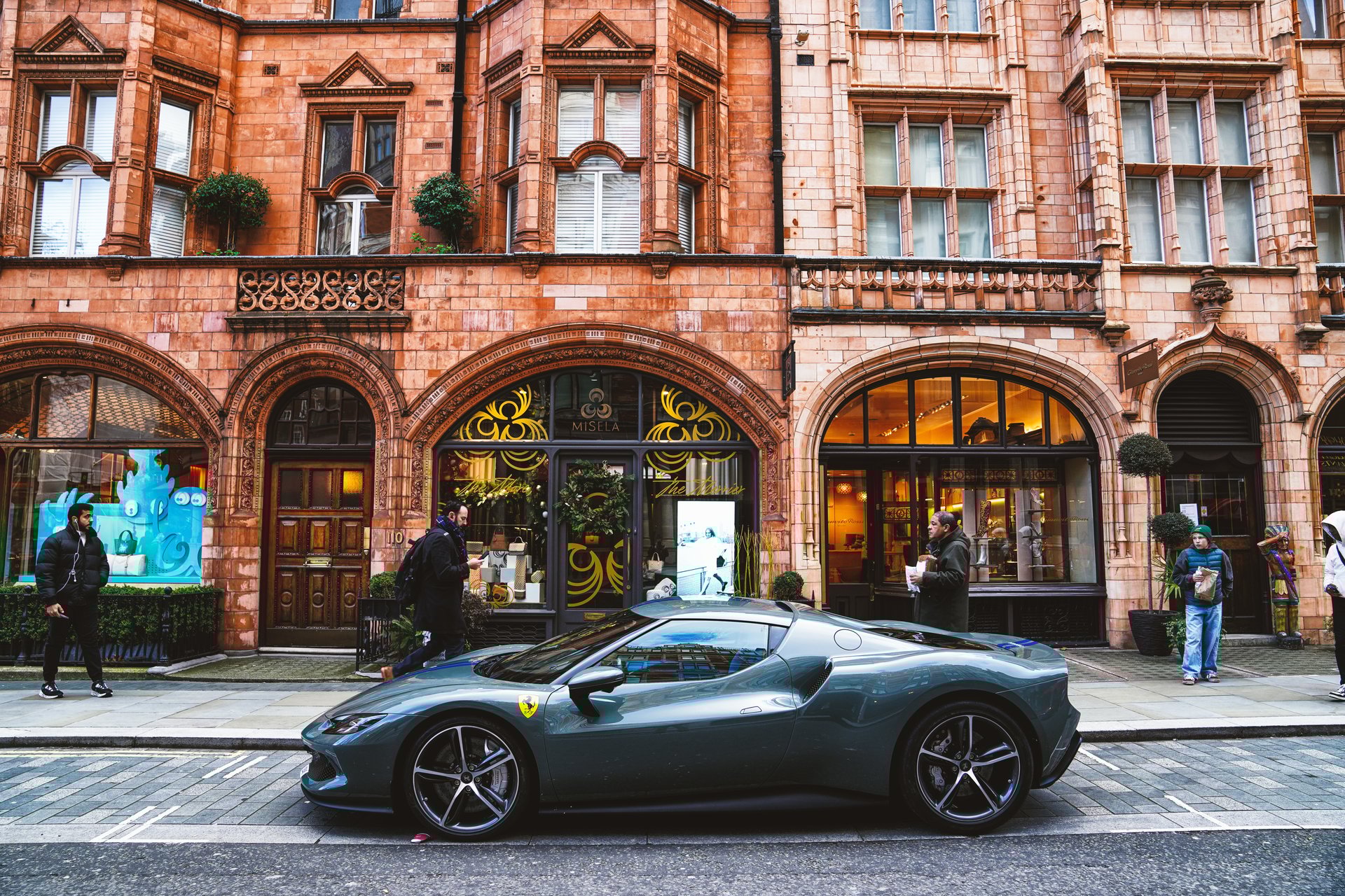 London, England, United Kingdom – 19th December 2024. A daytime street view in the central London area. a luxury, high-performance car. a Ferrari 296 prestige car.