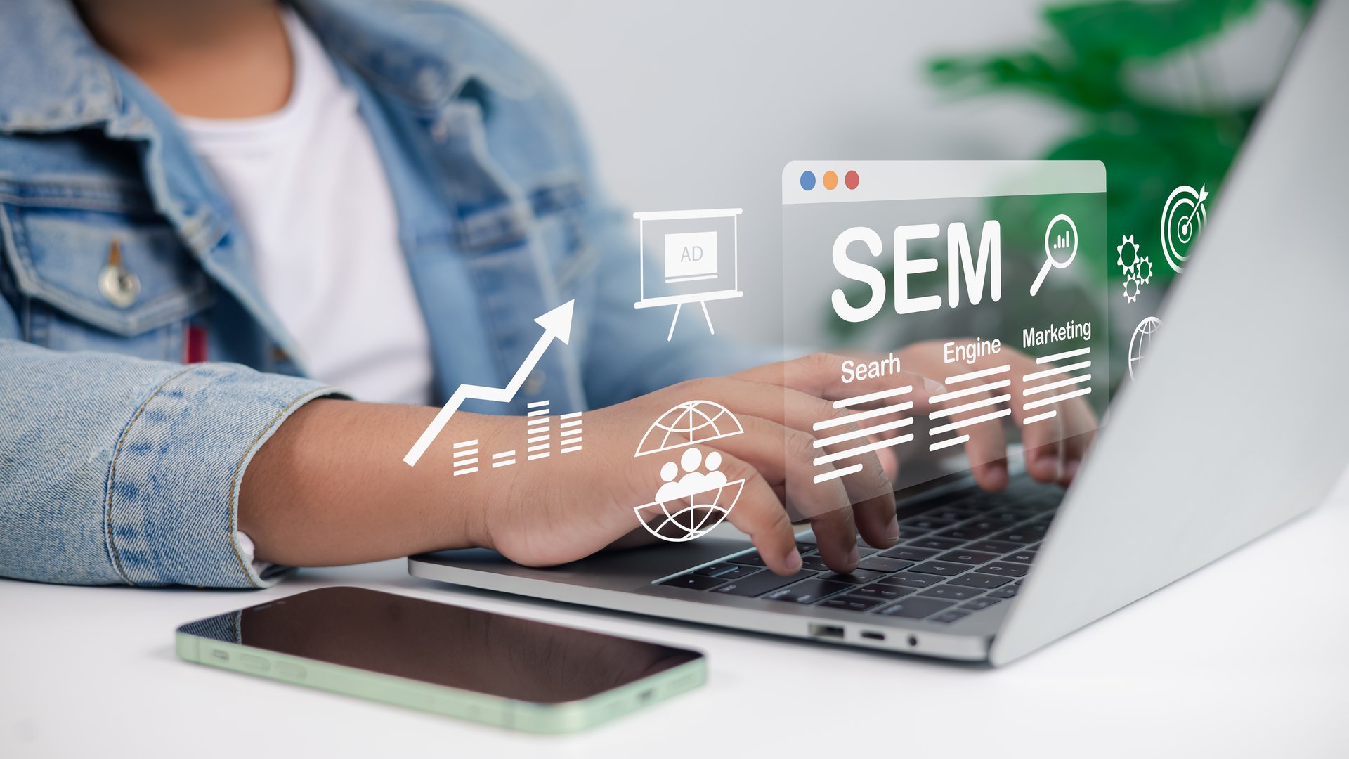 Businessman using laptop with SEM search engine marketing, digital advertising, SEO strategy, online marketing analytics, and business growth concept.