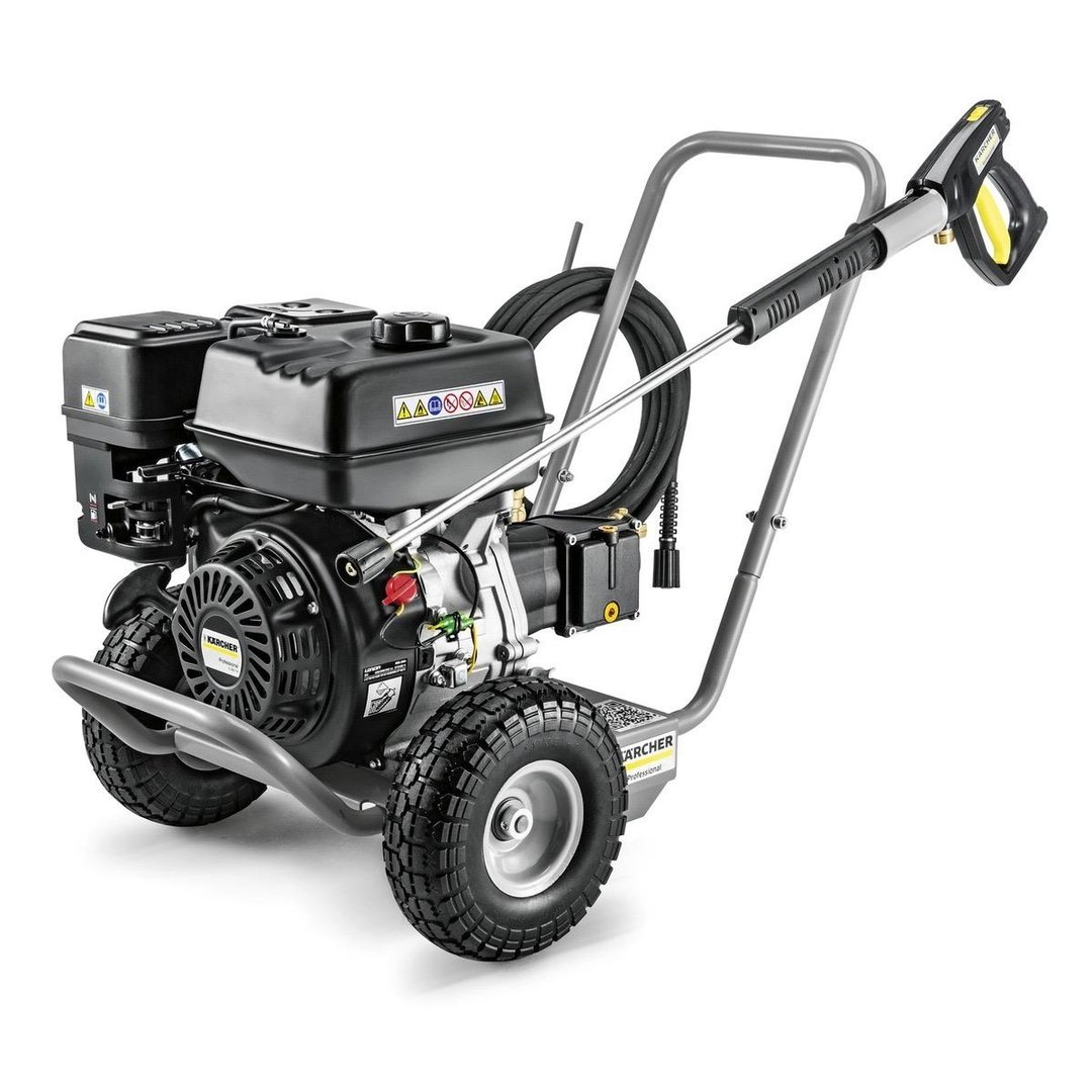 A portable pressure washer with a sturdy frame, large wheels, and a hose attached to a spray gun.