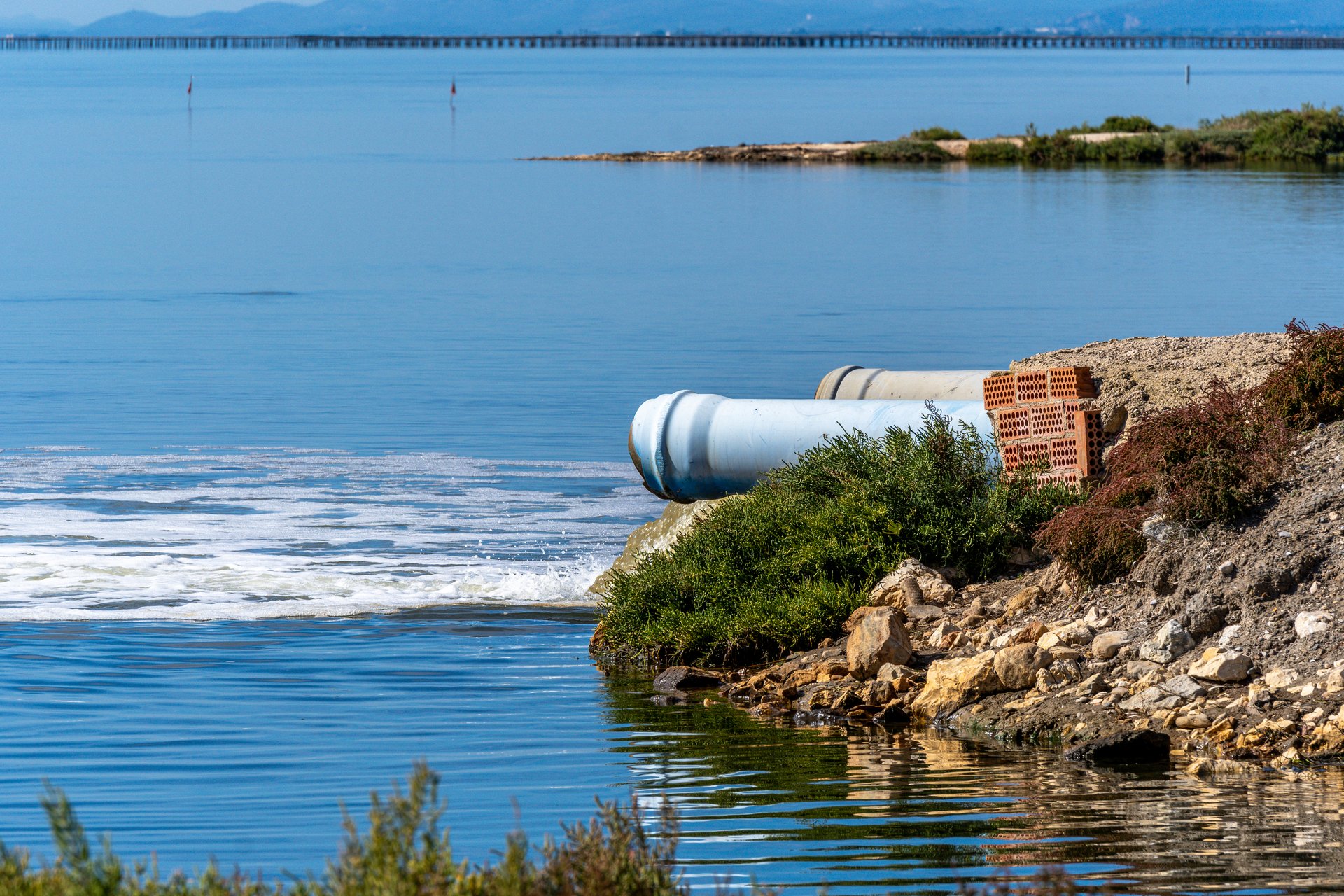 Industrial pipes that dump waste and contaminated water into the Mediterranean Sea at the mouth of the Ebro River.