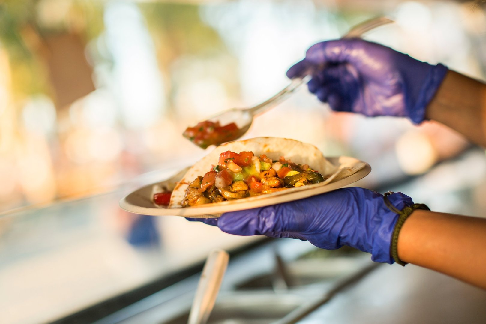 Chef preparing tacos in a food truck