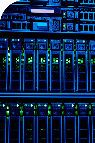 mask 7 | Iterators Close-up of a computer server rack showing rows of server drives illuminated by blue and green indicator lights.