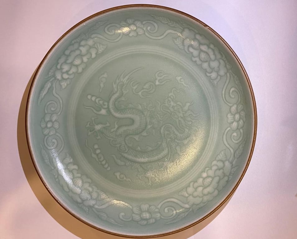 Longquan Celadon Dish Decorated with a Carved Dragon and Floral