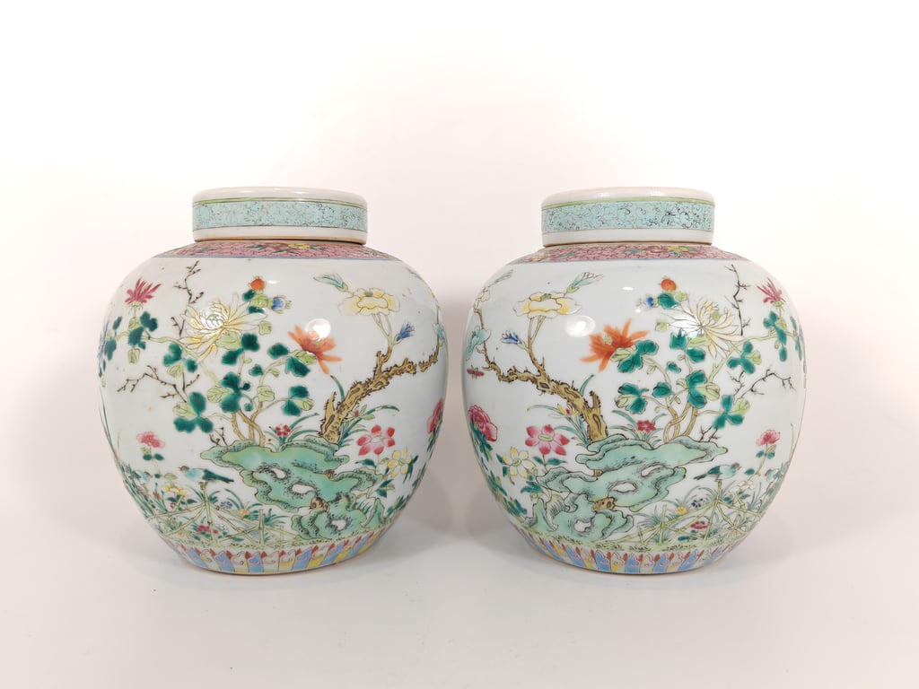 Qing Dynasty, Qianlong Period, A Pair of White Ground Famille Rose Four Seasons Flowers Covered Jars 清乾隆 一对白地粉彩四季花卉盖罐
, Qty-2