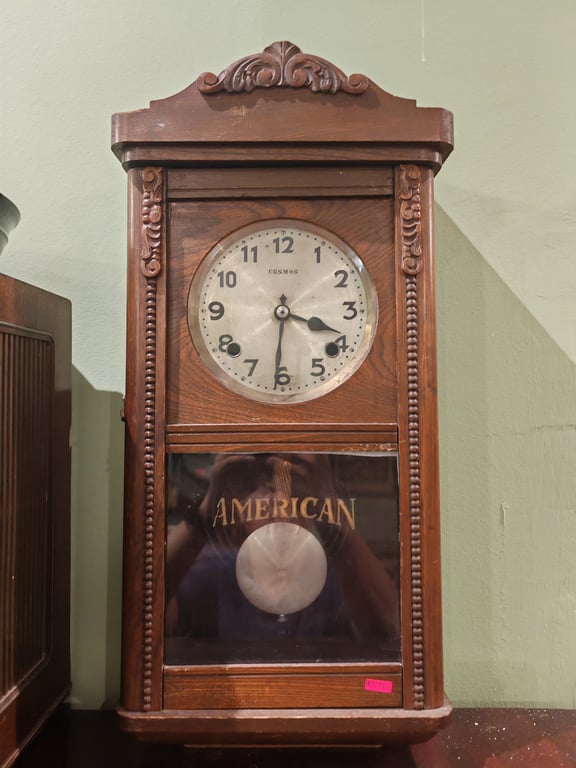 vintage Cosmos American Wall Clock with a Pendulum and a Wooden Case