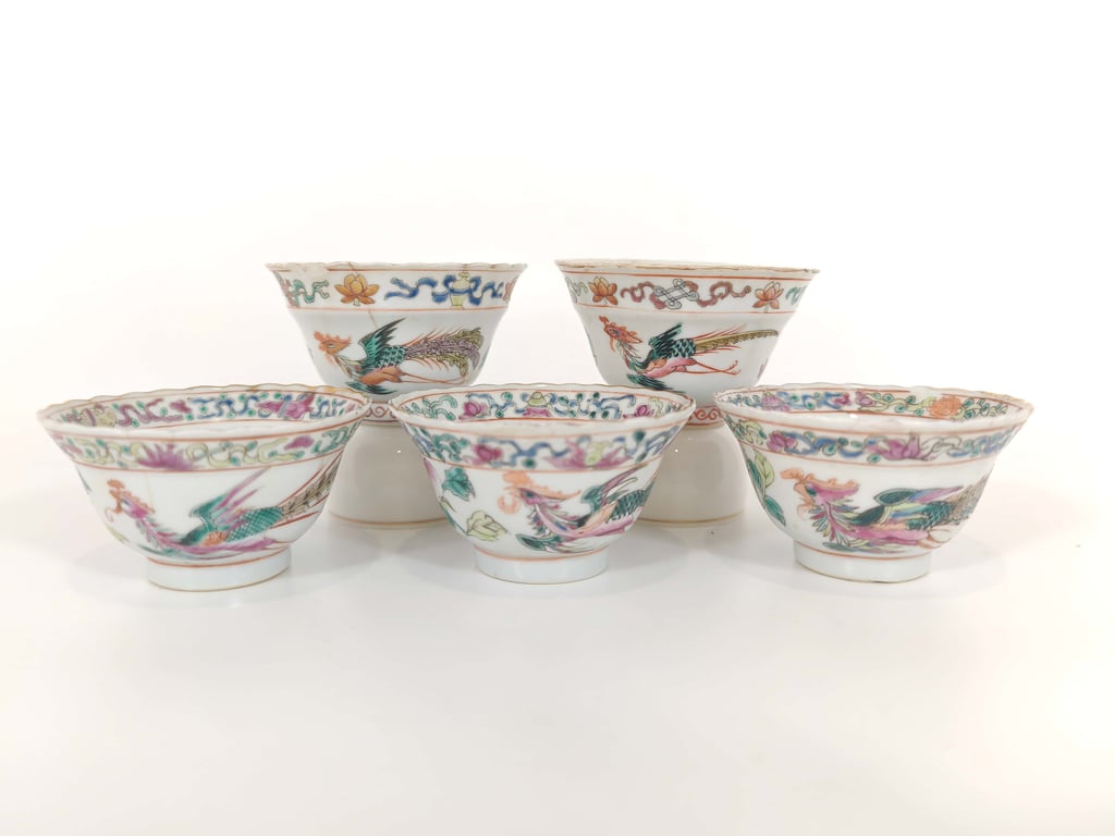 Late Qing A Group of White Ground Phoenix Peony Buddhist Emblems Nyonya Tea Cups
晚清 一组白地凤凰牡丹八宝娘惹茶杯, Qty - 5