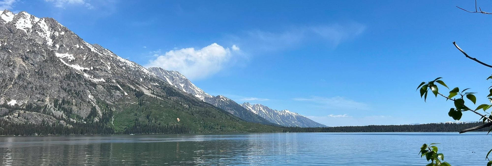 a mountain next to the lakeside