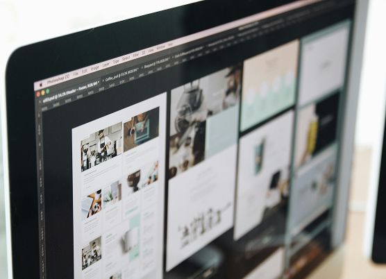 website designs on a desktop monitor