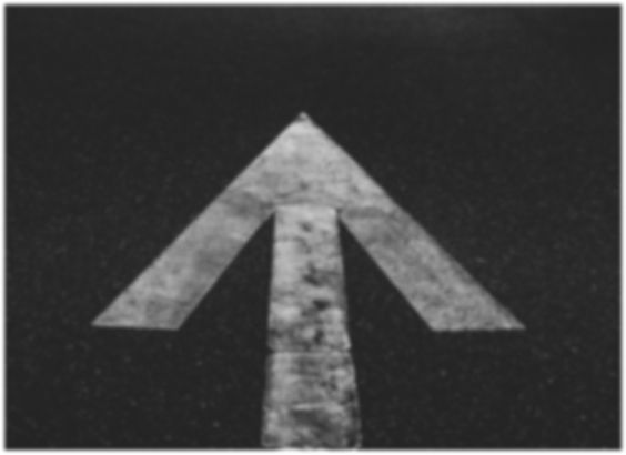 an arrow on a road