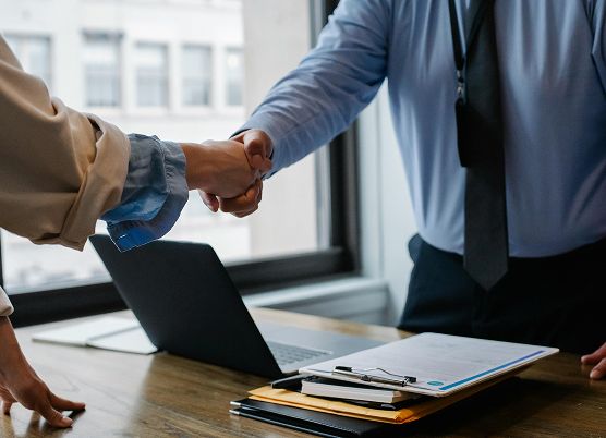 photo of business people shaking hands
