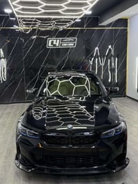 Bmw 330i 2021   السيارة عليها كت ام 2024 عليها داون بايب سعره 300$ ماش...