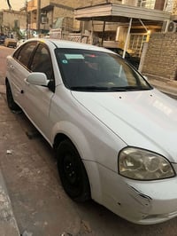سياره اوبترا 2012 سياره بسمي رقم بغداد الدولي  سياره بيه طخه بلجاملغ ا...