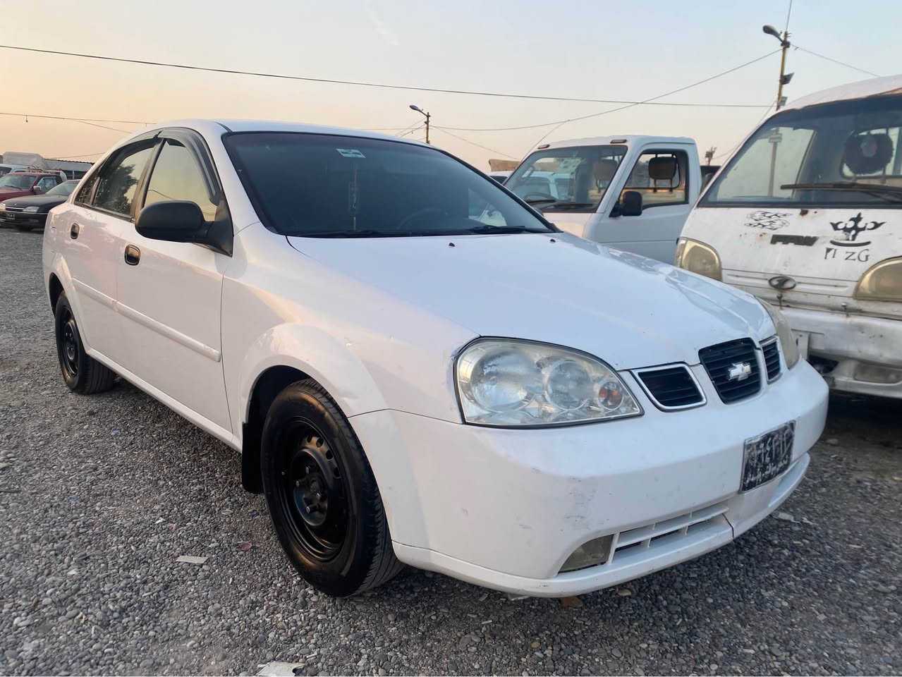 أوبترا ٢٠٠٤ • أوراق كاملة • قفل مركزي