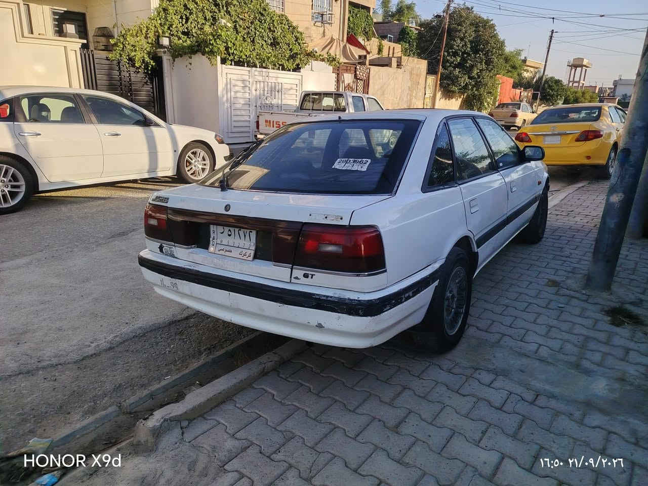 مازدا موديل 91 للبيع
محرك 12 بخ
محرك وا كير شرط
وا تخم تايرات جديد
وا سنويه مشروع وطني.

مكاني كركوك

***********

نص مكتوب في الصور:
- HONOR X9d 16:50 21/09/2026