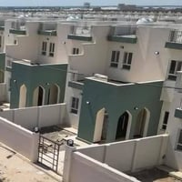 مجمع بوابة النجف • ٢٠٠م • وجه كوفة