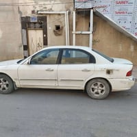 أوبتما • ٢٠٠١ • النجف