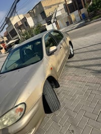 نيسان كزما ٢٠٠٤ سياره بلاديه بدون اي ضرر بيها جراد مكينه كير مضبوط تبر...