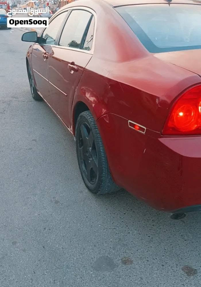 ماليبو ماروني موديل 8 وارد امريكي ضربه جاملغ خلفي 
تبريد تدفئة 
كير مكينه خير من الله 
رقم بابل مشروع وطني 
شفتات سرعه بالستيرن 
شاشه اندرويد لمس 
وباقي مواصفات معروفه
مكانها بغداد ***********

نص مكتوب في الصور:
- السوق المفتوح
- OpenSooq
- السوق المفتوح OpenSooq
