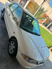 بروتون • ٢٠٠٤ • كير اوتو