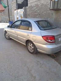 للبيع كيا ريو 2004 رقم بغداد كير عادي سياره كامله من كلشي محرك كير تبر...