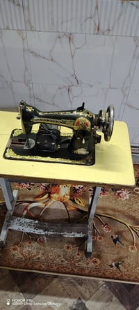 مكينة خياطة • بابل