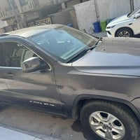 جيب لاريدو  موديل ٢٠١٤ ماشية ٢١٠ الف كيلو وارد امريكي بدون ايرباك  حاد...