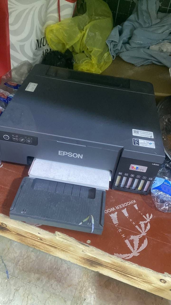 طابعةايبسون محورDTF+مكبس حراري للبيع الطابعة تطبع على ملابس السعر 650وبيهن مجال بسيط مكاني بغداد الدورة ***********
