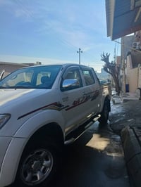 هايلوكس • ٢٠٠٩ • ابيض