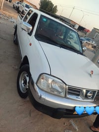 البيع نيسان 2014مكفوله  سياره جاهزه من كلشي وبسمي07838651835