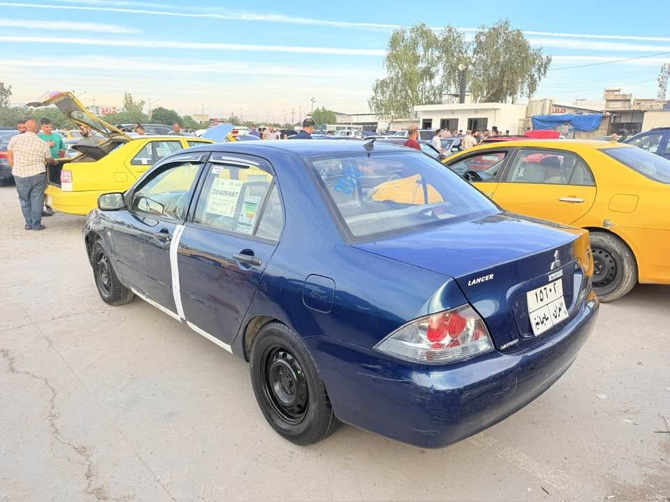 لانسر • ٢٠١٠ • ضرر باب سايق